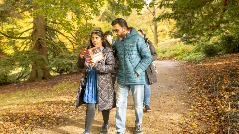 A family on an autumn walk at Lyme, Cheshire